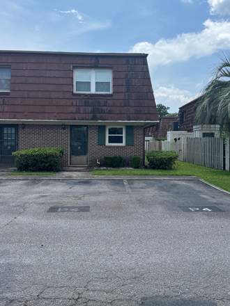 Street view; 2 assigned parking spaces - Carolina Pines