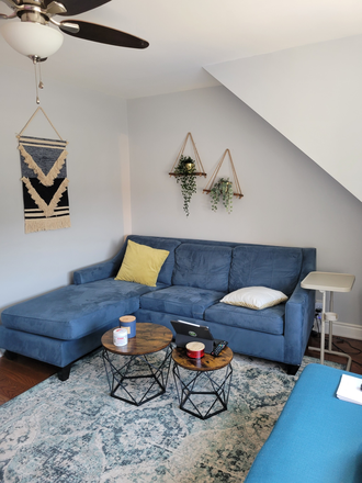 living room (all furniture included) - Large bright one bedroom apartment with in-unit laundry, AC, and great access to parks and transit