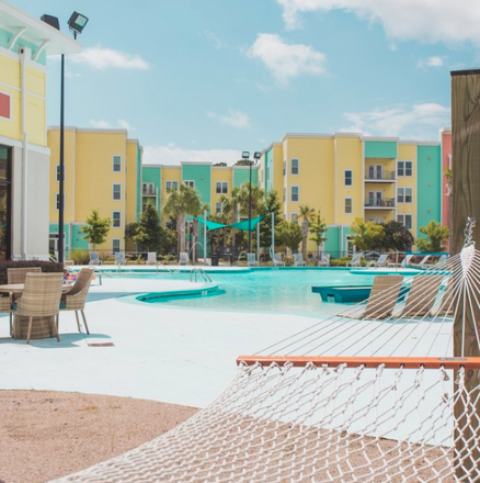 Resort style pool with hammock garden - Progress 910 - Leasing SOON for Fall 2025! Apartments