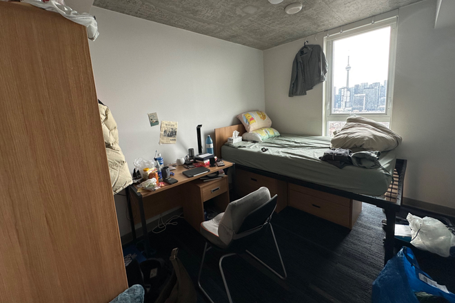 The room - 1 Furnished Bedroom in CampusOne 4-Bedroom 2-Bathroom Unit with stunning CN-Tower view