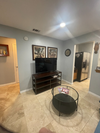 Living area - Private Bedroom for female student available Starting May 1, 2026  $900 a Month Townhome