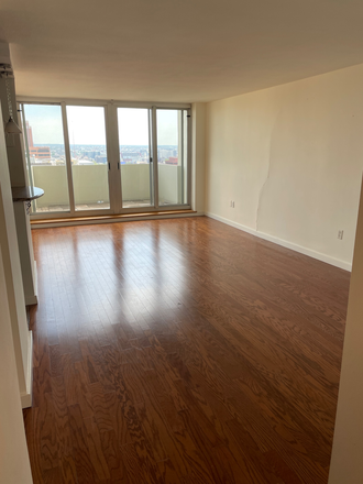 View of living room/dining room - Studio apartment with balcony overlooking Washington Square Park on 25th floor