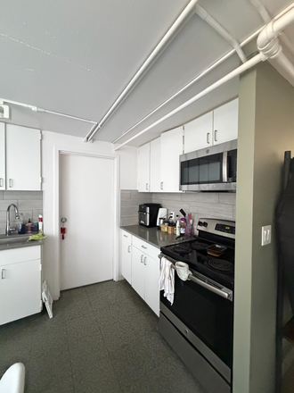 Kitchen - 3 bedroom 2 bathroom apartment located in front of Charles river