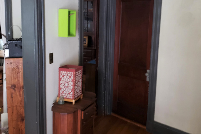 Front hallway, door to bedroom to right - Charming 2-bedroom right on Tufts campus Apartments