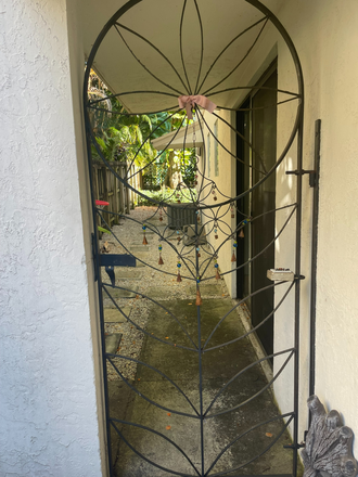 Side entrance - GREAT FIND! Coconut Grove Townhome with Room for Rent