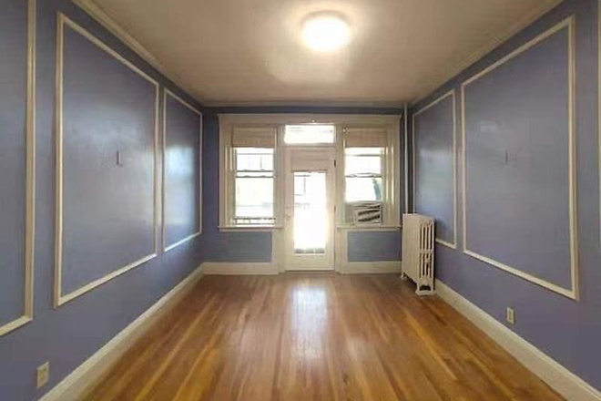 Living room and Balcony - This Apartment closes to BC campus, BC shuttle, B.C.D subway and BU
