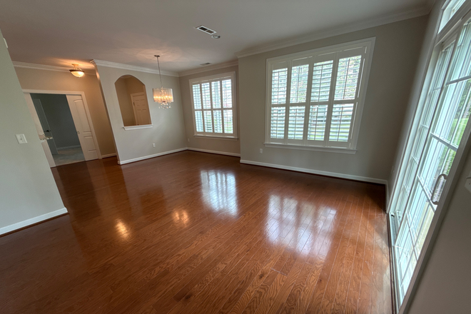 living into dining - Golf Course Tranquility — Effortless One-Level Living with attached Garage in Williamsburg Condo