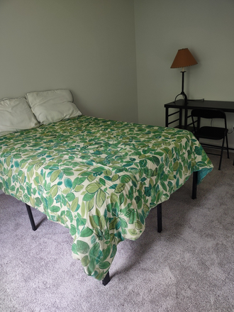 Bedroom, desk, kitchen, laundry room, view of the woods - New Home in Sea Island Preserve on Johns Island