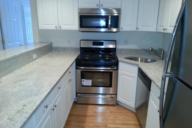 Visit hubrealtyproperties.com - Beautiful 3 bedroom with dishwasher, across from BU West Campus Condo
