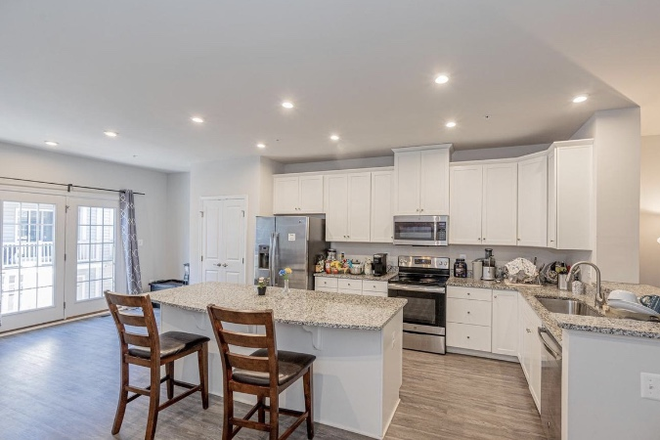 Kitchen - One room open in 5bed/4bath Greenbelt Station Luxury Townhome