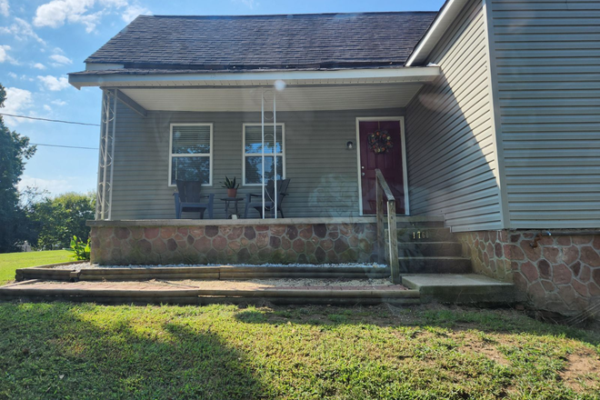 Front Porch and Front Door - Updated 3 BR 2 BA House with off street parking in Quiet Neighborhood 3 miles from campus