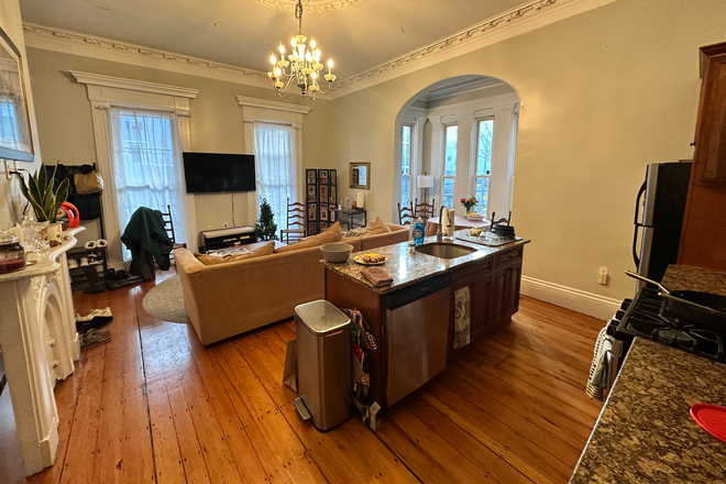a - LARGE AND IN CHARGE Apartments