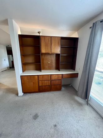 Bedroom view 1 with built in desk and storage - Affordable Studio on bus route to Med Ctr/Rice Condo