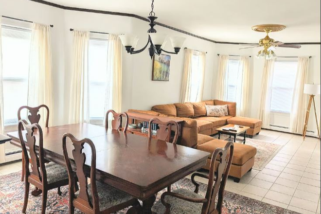 Double Parlor dinning room and Living room - Bright and sunny first floor apartment with private parking lot