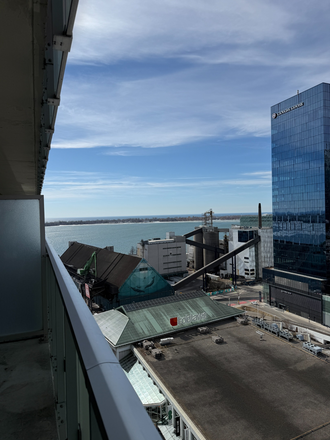 Balcony view - Master bedroom in a 2b2b condo near Sugar Beach, just south of St. Lawrence Market. WOMEN ONLY!