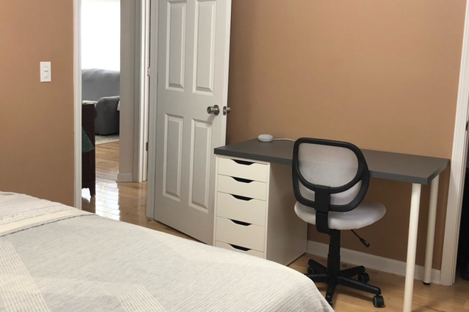 Upper-level back bedroom - Welcome Spartans: Furnished, 1GB Wi-Fi, parking House