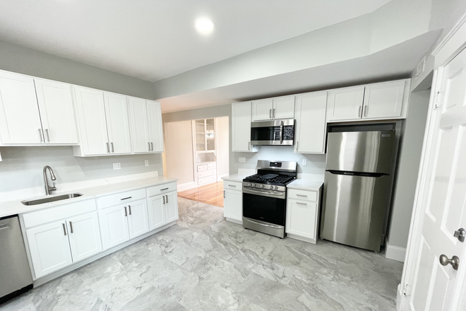 kitchen - Newly renovated 4 bed 1 bath with Central AC and Laundry in Unit!