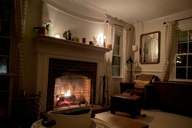 The fireplace heats the house as well as provides nice ambiance. It is a truly cozy living room. - Quiet 2 Bed 1.5 Bath House In Walkable Neighborhood