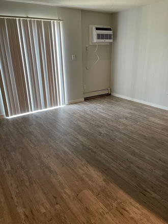 Living Room - Near Art, Law, Medical and Dentistry Buildings - 3 Blocks from Campus Apartments