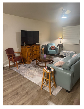 Living room in the home, Tv, coffee table, large couch and plenty of seating. - Affordable Room for rent, Two roommates, Close to Campus House