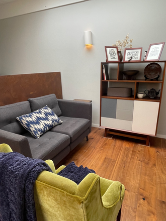 Living area - Modern light filled studio in quiet residential area by owner near hikes and bus to Campus or City