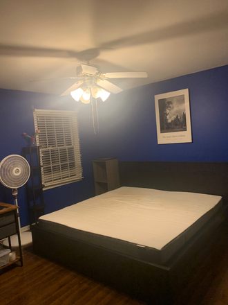 Furnished bedroom w king size bed - Furnished room in shared home-Ketterer Ct-Lawrence