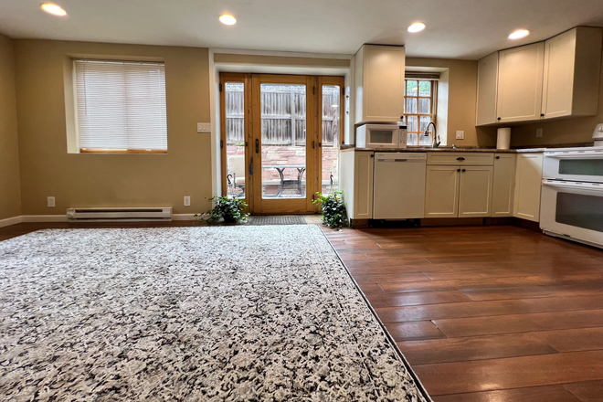 living room looking out to courtyard - $400 price drop.  Just 2 blocks to Campus, Nicely renovated 2 bedroom with private courtyard Rental