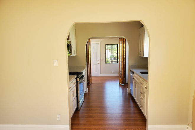 Galley Kitchen - 2BD/1BA Home with Bonus Room & Parking — Walkable Dimond District