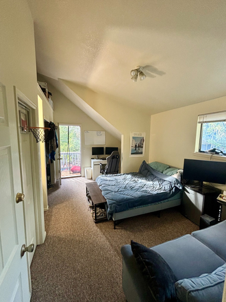 Your potential room including all furniture seen in the photo. - Fully furnished large room in a large house, 3 minute walk from campus, private deck w/view flatties