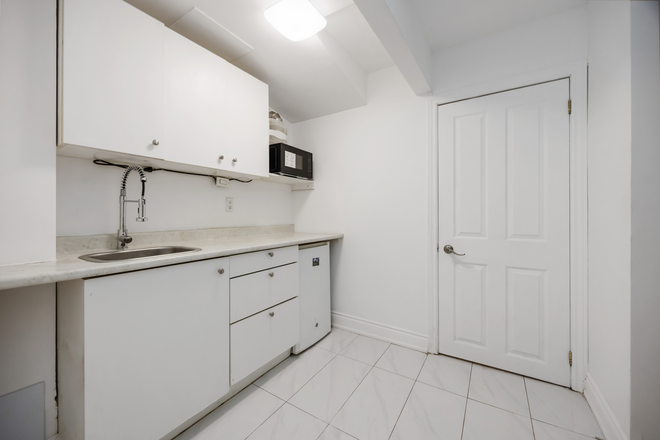 kitchen - Charming bachelor suite nestled in an great location. Just steps to all amenities. Townhome