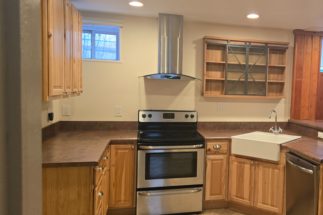 Kitchen with farm sink,  tile floors, cooktop stove, - DU Neighborhood | Spacious 1,000 Sq Ft Basement Apartment w/ Private Entrance | Utilities included.
