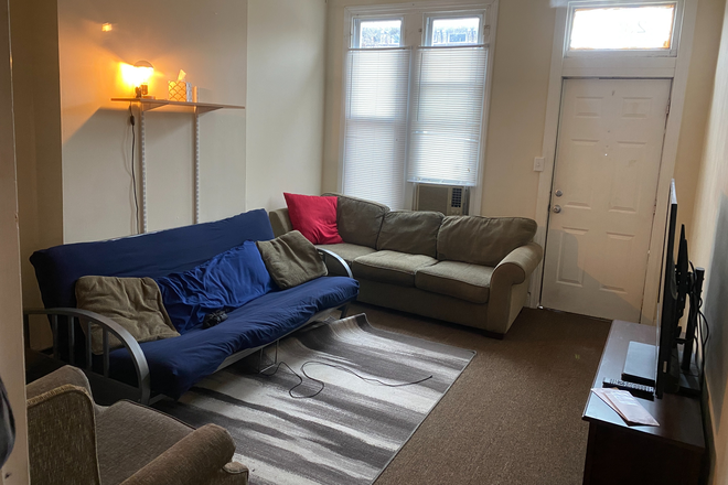 Living room that can be converted to 4th bedroom - Wheeler Street, 3-4 Bedroom, 1 Bath, Short walk to campus Townhome