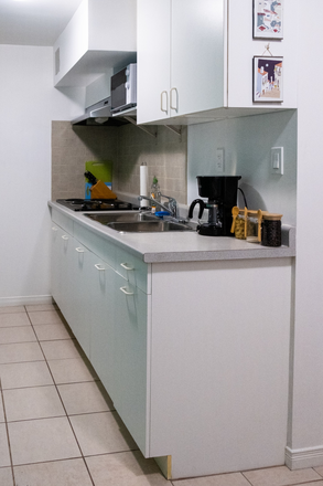 Kitchen station. - Modern 2-bedroom suite with A+ transit access Townhome