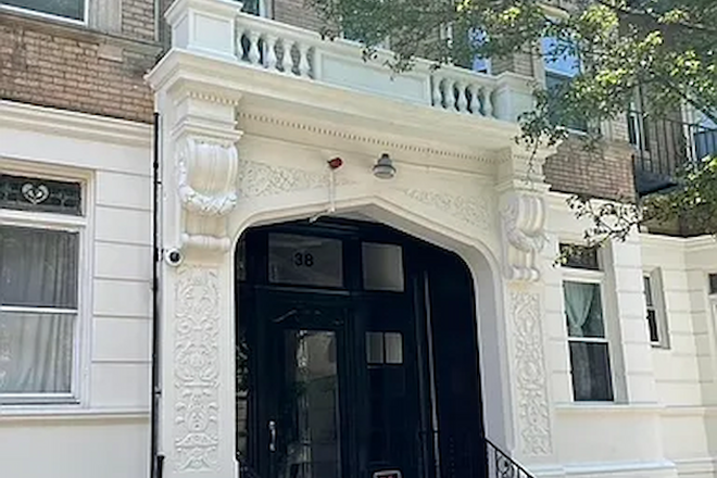 Front of Building - NO FEE Symphony area studio for 9/1 start. $2,460/mo. Great location near schools and hospitals. Apartments