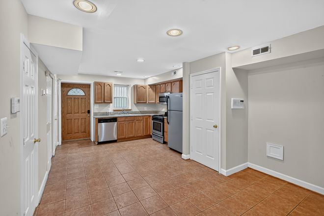 Kitchen & Back Door - Inviting and Secluded Row Home at the Intersection of Two Special Neighborhoods