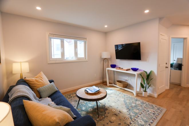 Living Room - STARS Thorndike Furnished Apartment