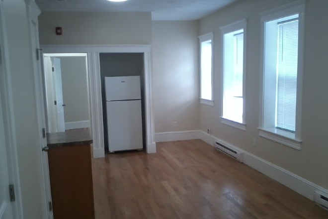 Visit hubrealtyproperties.com - Mission Hill, Spacious 4 bedroom 2 bathroom with renovated kitchen, on T, close to HMS Apartments