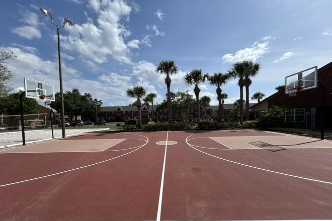 Basketball Court (apartment is in the back left of the photo) - Campus crossing on Alafaya.