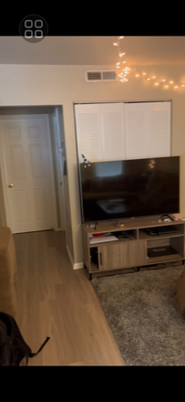 Walkway. Doors lead to bedrooms. - KMH Properties Apartments