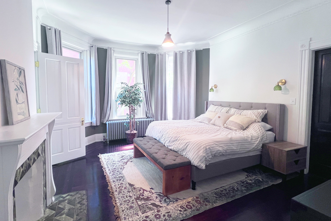 Bedroom. King size bed, walk in closet, decorative fireplace, desk with chair. - NEWLY RENOVATED FURNISHED All UTILITIES INCLUDED, 1BR/1BA in Safe and Walkable Neighborhood