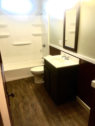 One of our updated bathrooms - 4 bed/ 1 and 1/2 bath close to North Campus and UCrossing Apartments