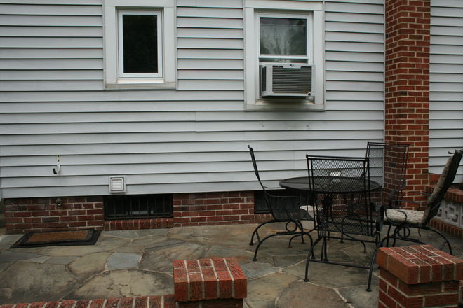 Exterior Side Patio - HOUSE-Charming 3 Br 2 Bath Cape Cod close to UMD Shuttle and Metro stops!