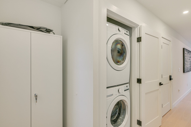 In unit laundry - Near Biotechs & MIT: Cozy Condo w/ Fireplace