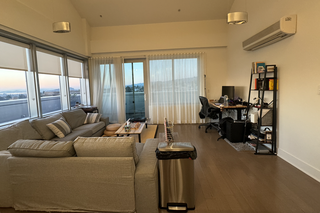 Living Area + Balcony Access + Desk - Gorgeous loft-style penthouse 3 minutes from campus with bay and hill views