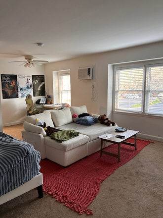 Open living room and bedroom floorplan - Charming Harwood Studio Apartment
