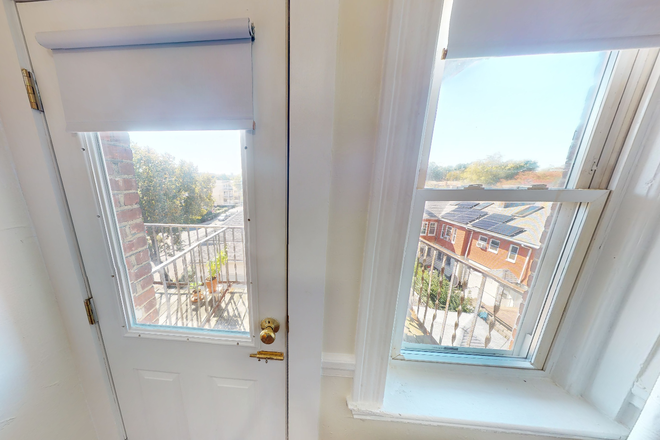 Visit hubrealtyproperties.com - Large studio with renovated kitchen and dishwasher, in Brighton Apartments