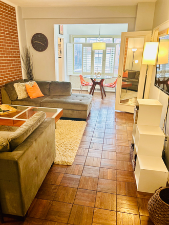 Living room with 50 Inch Roku TV - DuPont Circle - Furnished Jr. 1- Bedroom. WIFI & utilities incl -1 block to Red Line Metro.