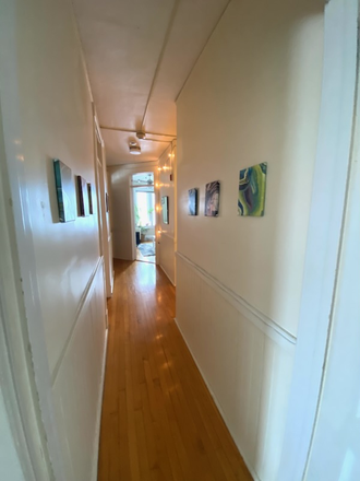 hallway - Available 8/1, 4 bedroom, 1.5 bath, gleaming hdwd flrs, high ceilings, center of downtown loca Apartments