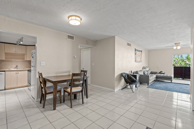 Living room - Fully furnished Condo that is less than 1 mile from campus and all utilities included!!