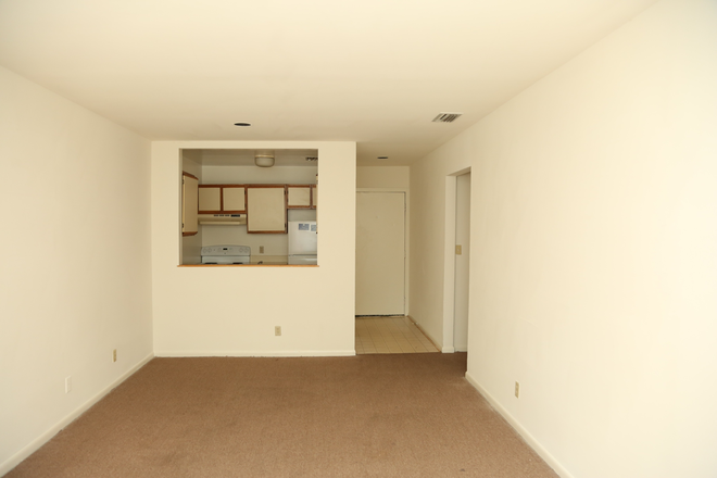 Living Room - 4 Bedroom Apartments Near The Corner